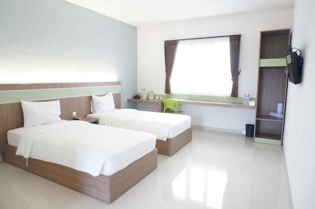 Rumah Cassa Guest House Surabaya Bilik gambar